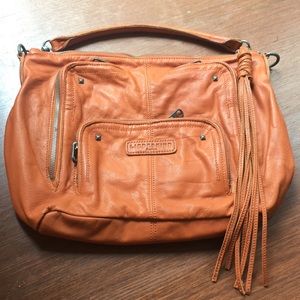 Orange leather handbag by Leibeskind